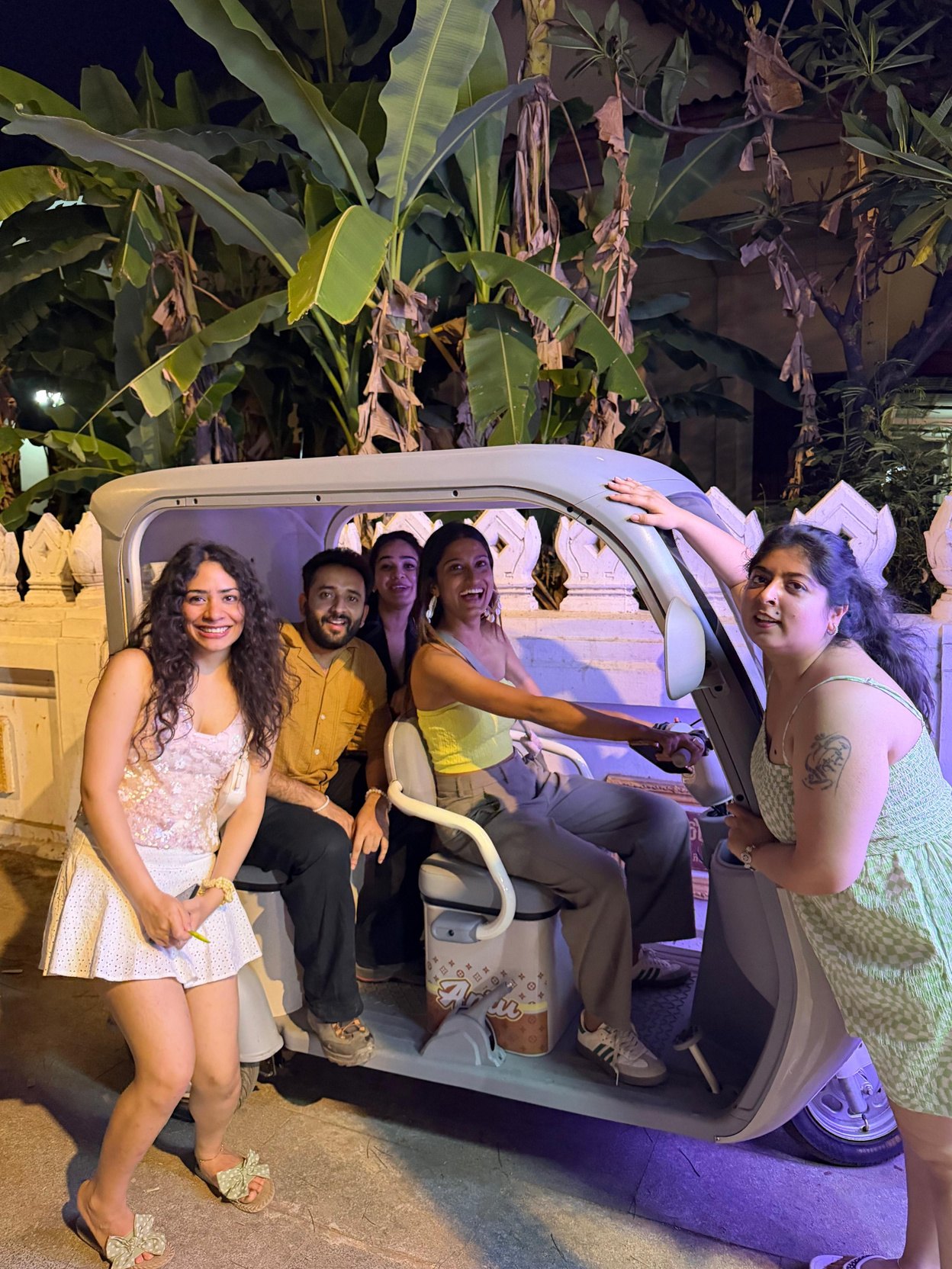 Travellers in a tuk-tuk